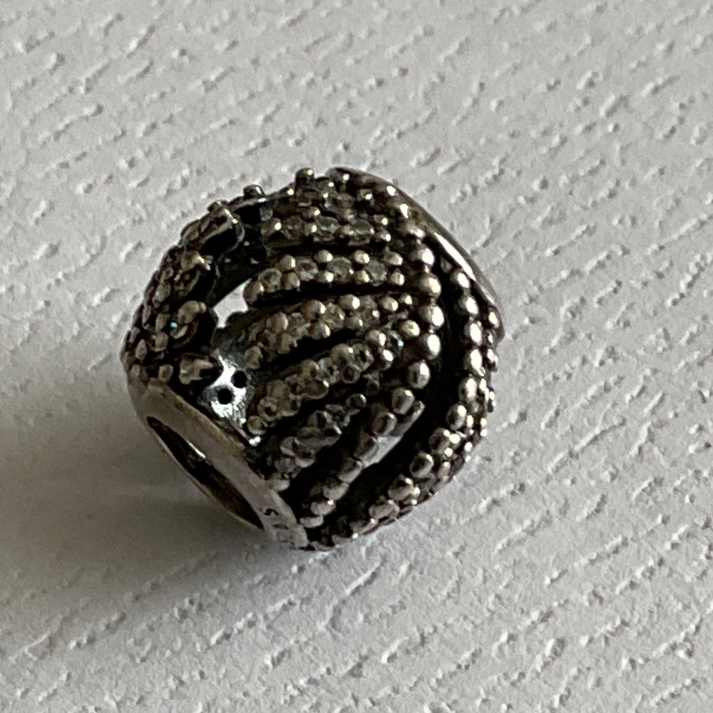 Pandora feather charm